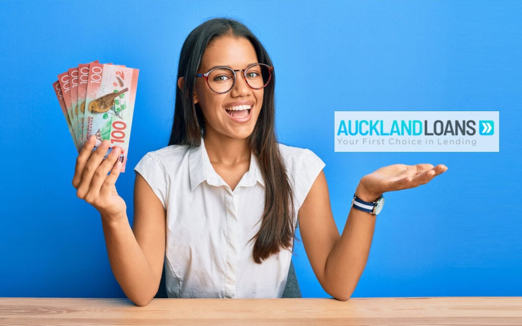 a woman holding cash from a loan from Auckland Loans