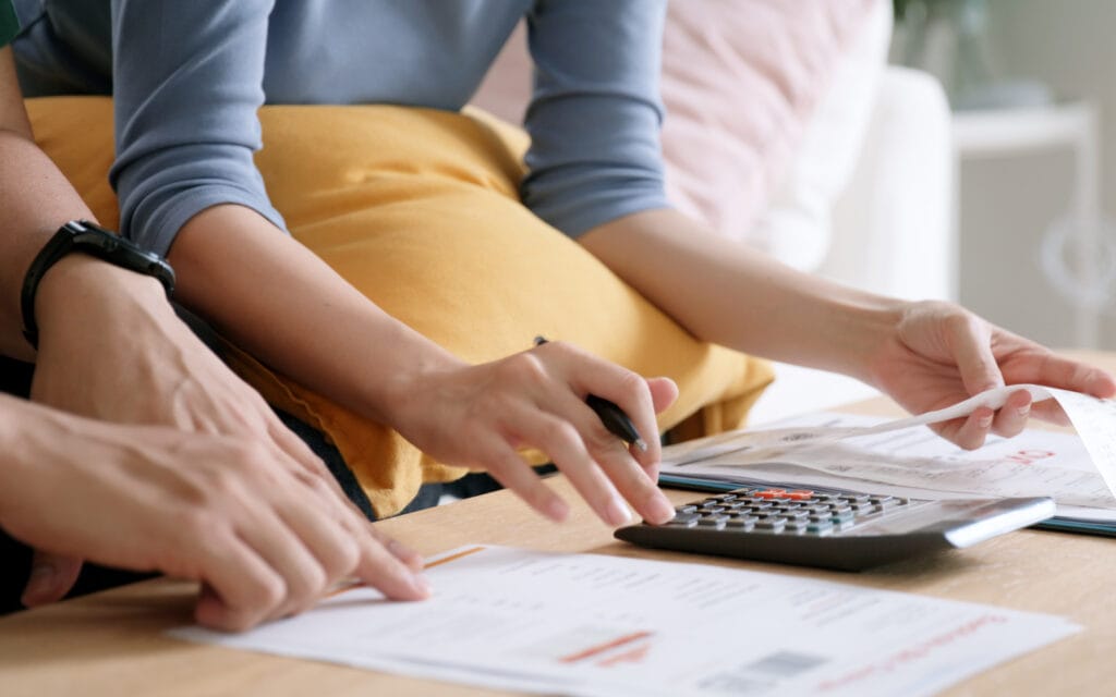 woman using calculator